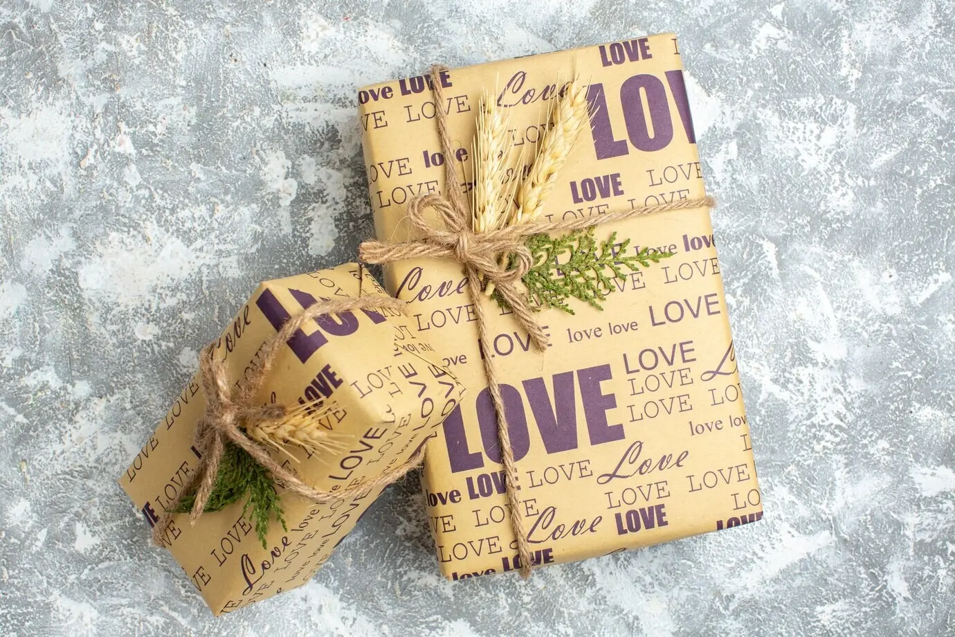 View from above of lovely large and small wrapped Christmas gifts on an ice surface.